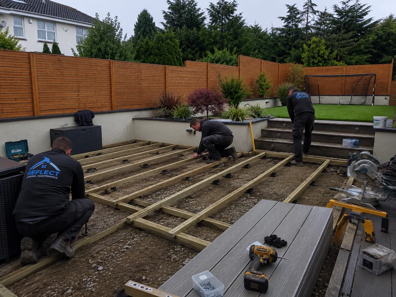 Old weathered timber decking before replacement Dublin — Reflect General Maintenance