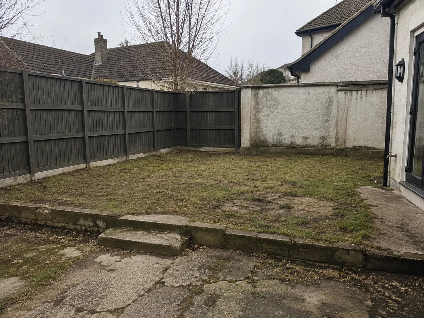 Bare garden before decking installation in Dublin