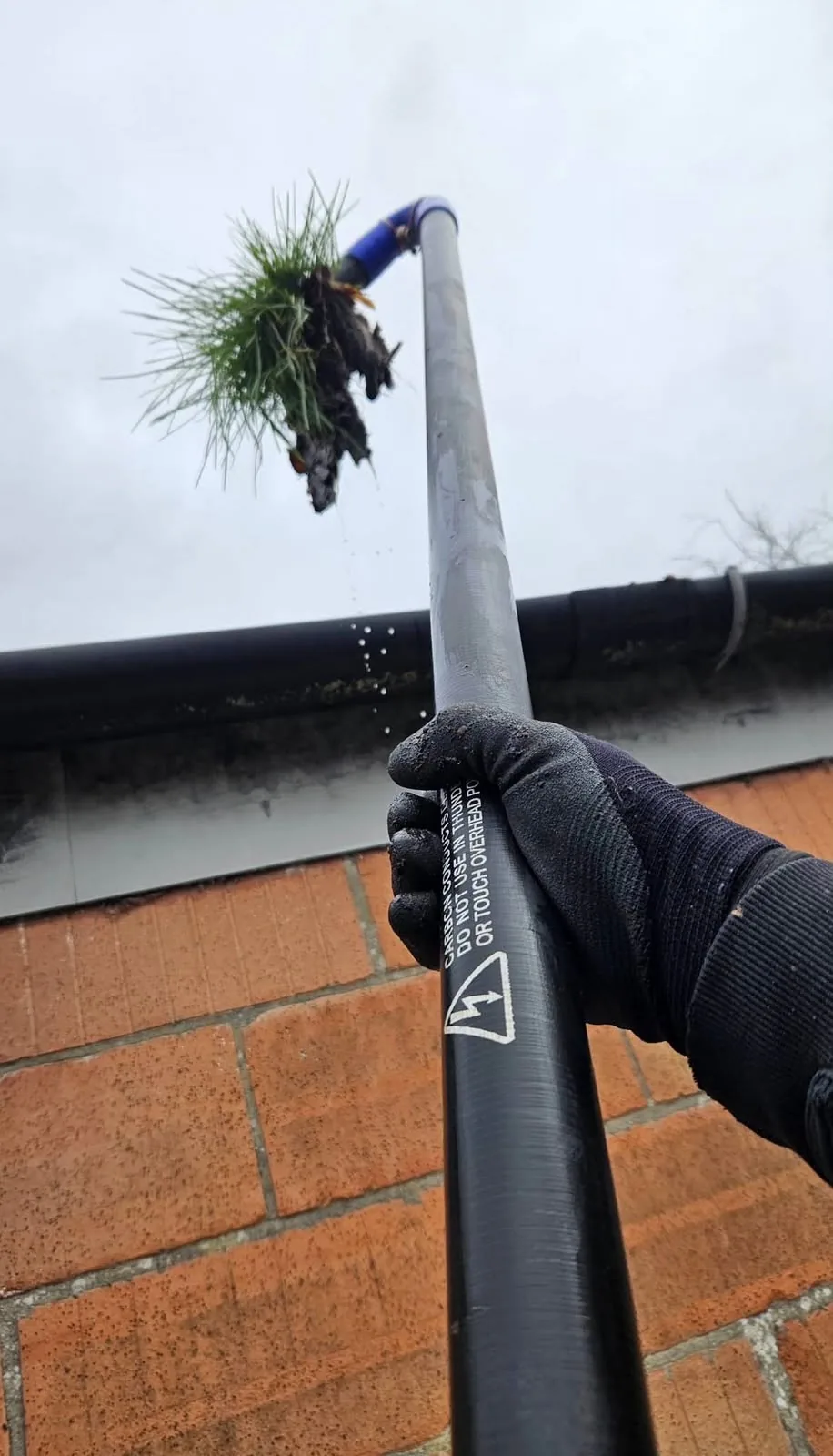 Reflect clearing gutters with a SkyVac vacuum system in Dublin