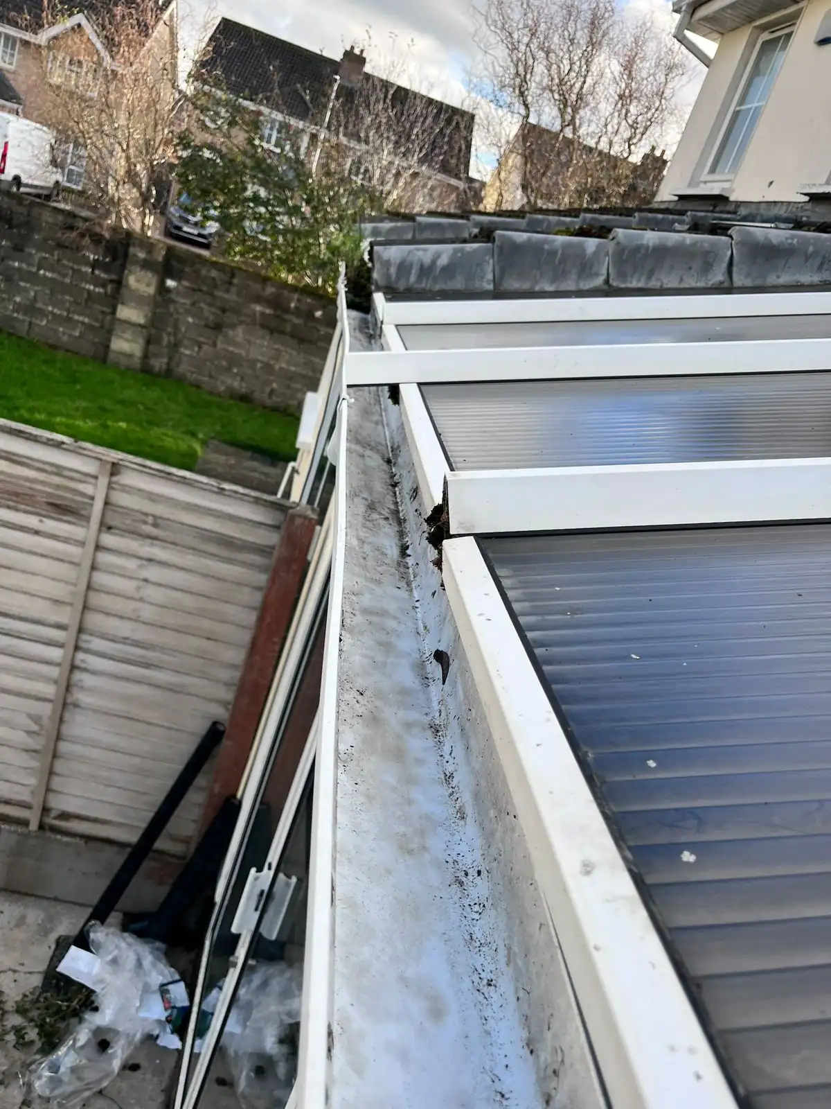 Gutter outlet area after debris removal