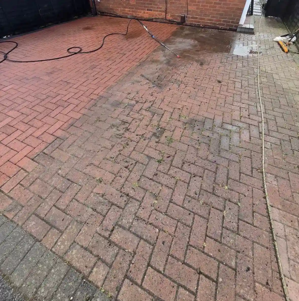 Driveway surface cleaning during Reflect driveway cleaning work
