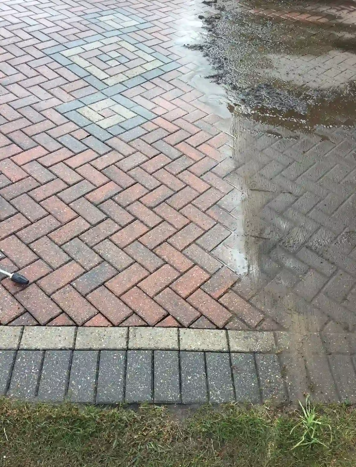 Concrete driveway after cleaning by Reflect